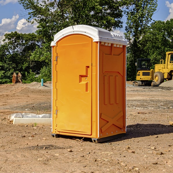how often are the porta potties cleaned and serviced during a rental period in Chisholm